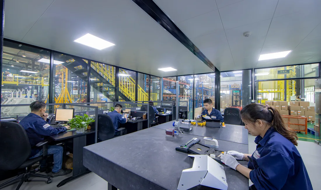 Quality inspection lab where technicians measure and validate custom parts